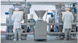 two-workers-at-a-food-production-line