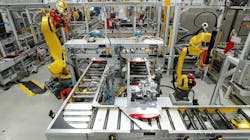 Figure 2: Integrating a robot for removing objects from a conveyor in a tight workspace can require precision engineering.