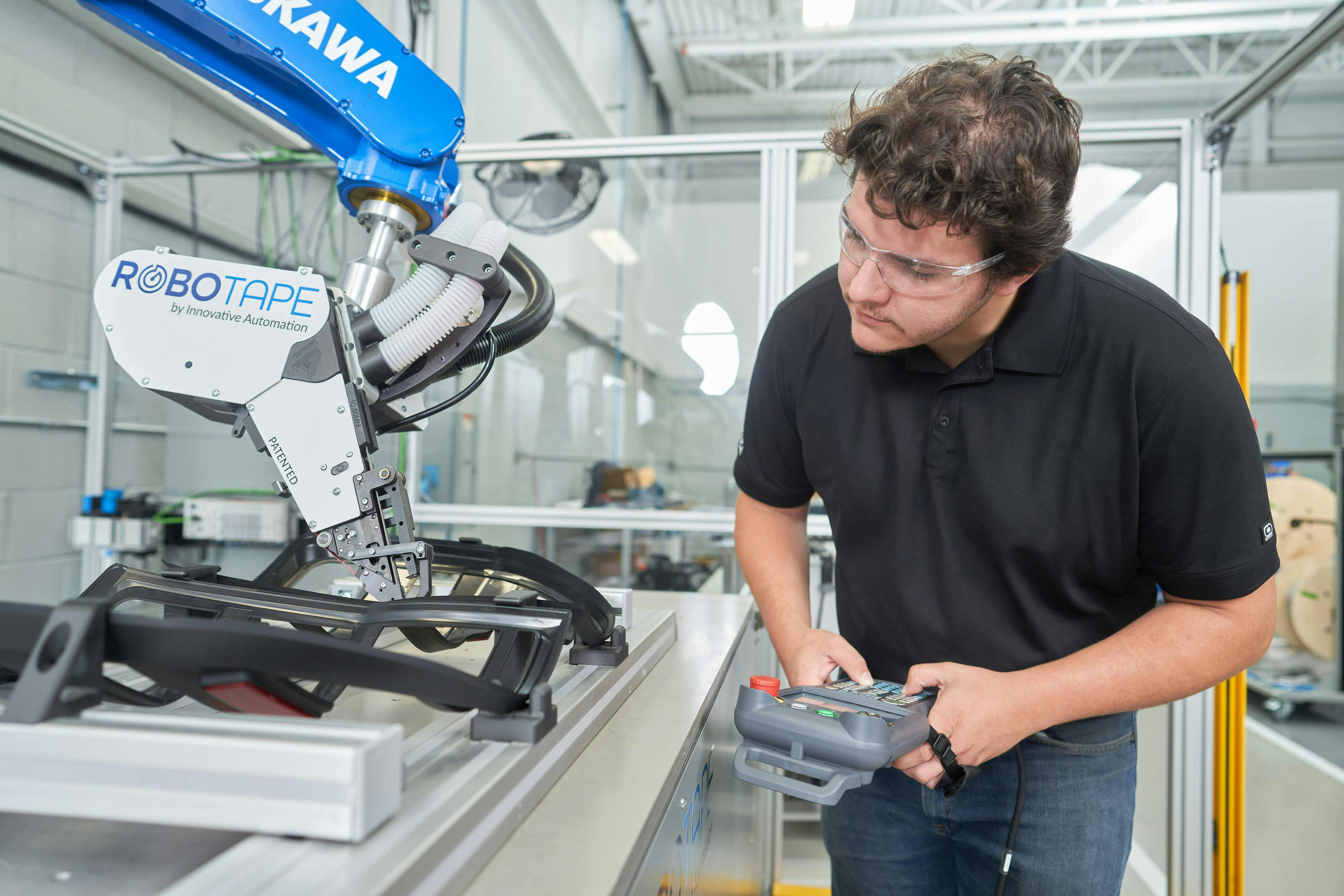 Figure 2: RoboTape can take on complex geometries using its highly maneuverable and compact application head. Figure 2: RoboTape can take on complex geometries using its highly maneuverable and compact application head.