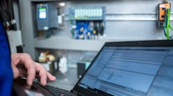 Programmer of PLC checks correct function of program