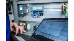 Programmer of PLC checks correct function of program