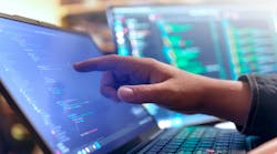 Computer engineer is typing console script code by hand Computer engineer is typing console script code by hand