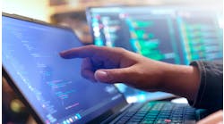 Computer engineer is typing console script code by hand