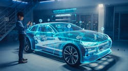 automotive engineer uses tablet with AR for car design analysis