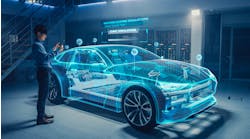 automotive engineer uses tablet with AR for car design analysis